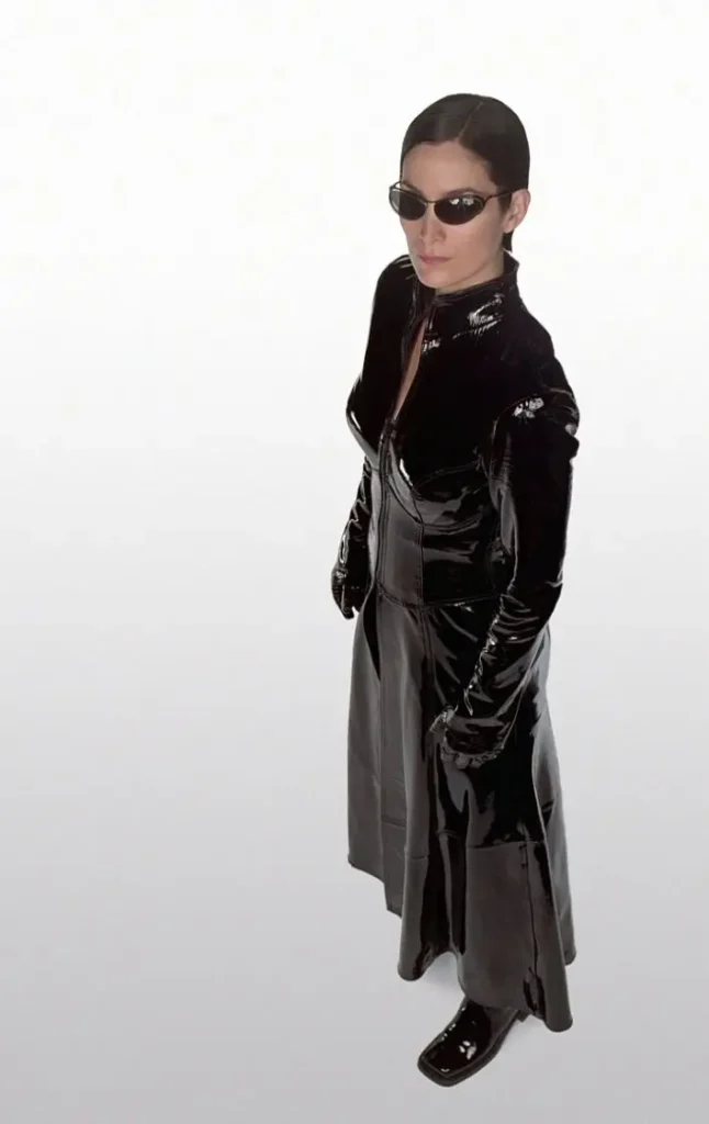 iconic image of trinity from the matric wearing her long leather trench coat