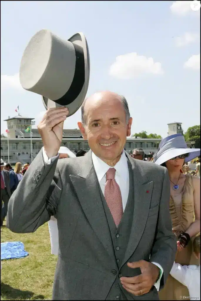 Image of Jean Louis Dumas for Hermes at a horse race.