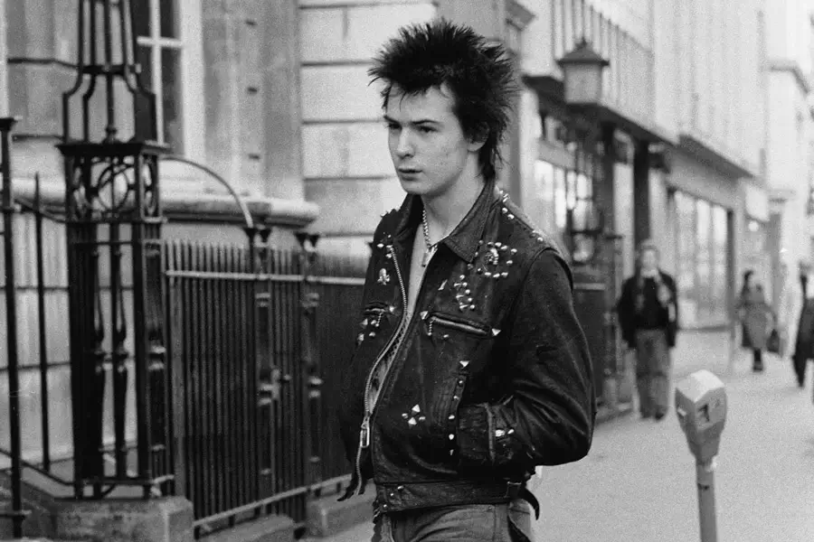 black and white vintage image of sid vicious wearing his iconic studded leather jacket