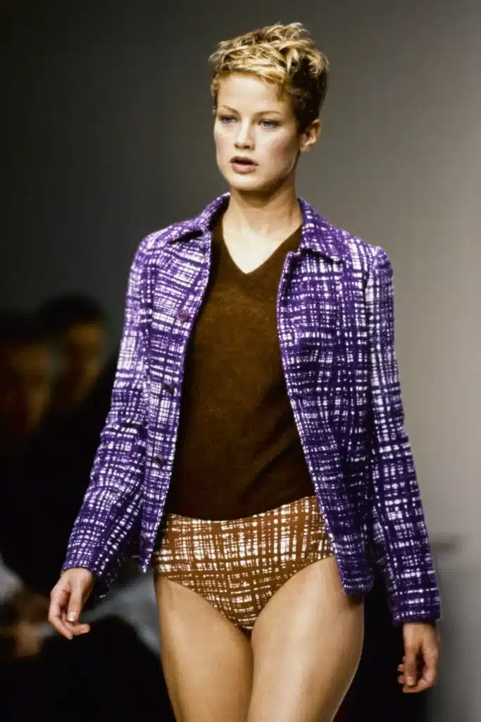 Model walking on runway for Prada spring/summer 1996