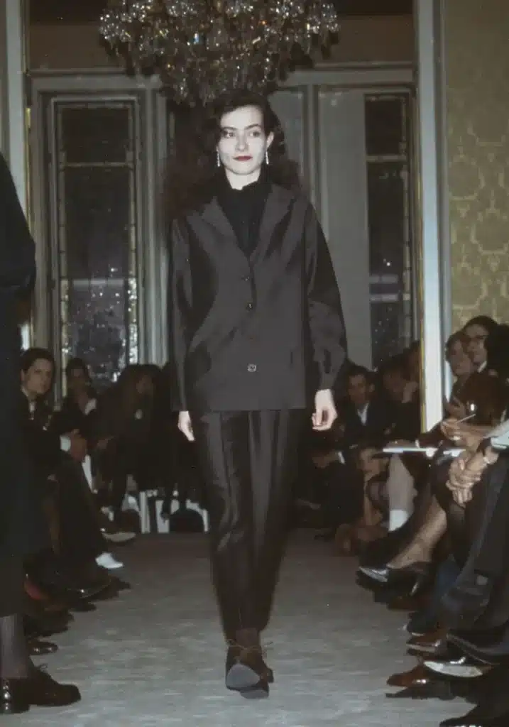 image of model walking down runway for Miuccia Prada’s first ready-to-wear collection, FW 1988