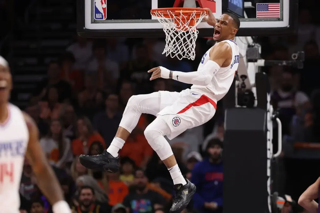 Russell Westbrook dunking for the LA Clippers, wearing their all white jersey