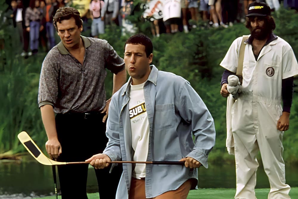 dam Sandler as Happy Gilmore, wearing a loose shirt, t-shirt, and comfortable pants on a golf course, illustrating the Normcore fashion style.