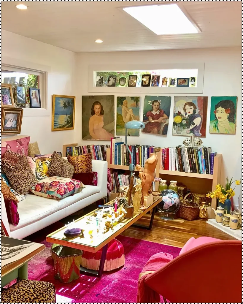 Eclectic interior of Betsey Johnson’s Pink Malibu retreat, filled with vibrant textiles and a mix of furnishings.