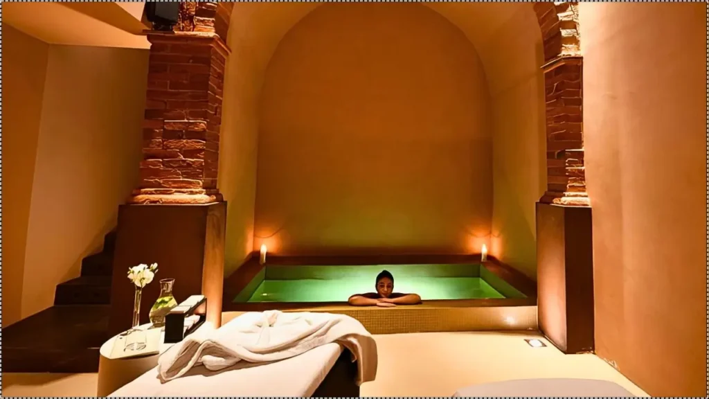 Luxurious spa retreat inside the Ferragamo family’s Il Borro Estate in Tuscany, with a warm-lit plunge pool.